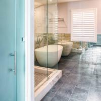 bathroom walk in shower with detached tub