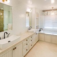 Bathroom with double sink and large vanity area