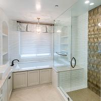 Bathroom with shower and bathtub