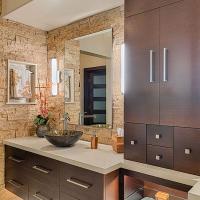 bathroom with ceiling to floor cabinets