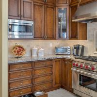 Kitchen with ranch style custom drawers