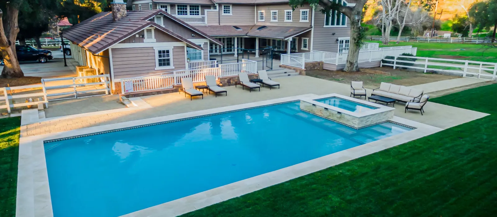 Picture of a backyard and pool.